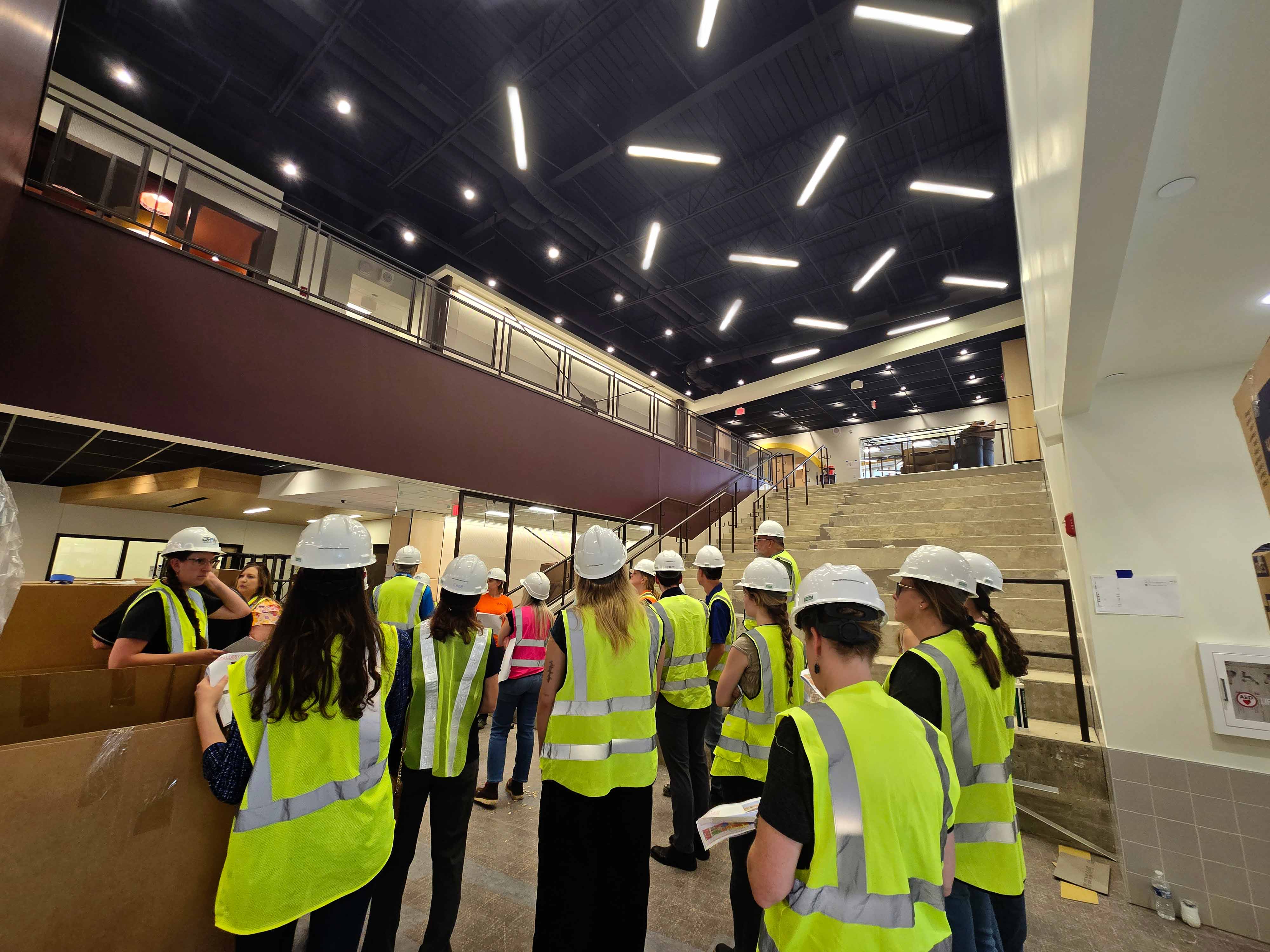 The lobby of the new elementary school featuring the learning steps and school pride colors
